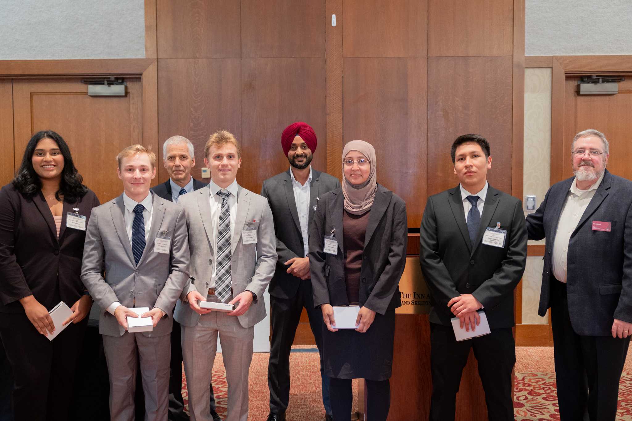 From left: Akshara Ravi, Brandan Allen, Daniel Connors, Noah Lockard, Harpreet Dhillon, Ayia Ismael, Cesar Bautista, and Joe Adams