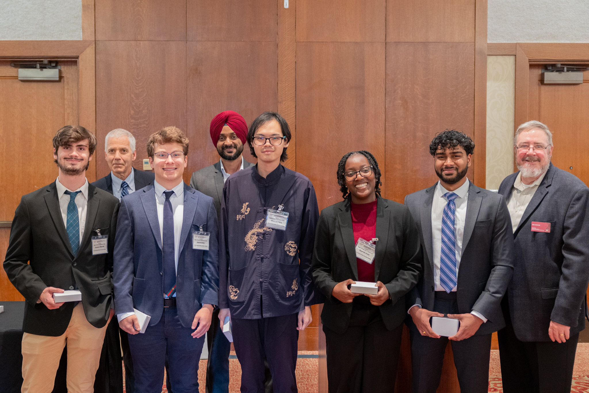 From left: Domenic Marcelli, Daniel Connors, Garret Detter, Harpreet Dhillon, Wenxaun Wang, Rashelle Amao,  Kiran Gouttumukkala, and Joe Adams