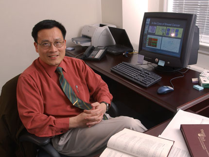 Yue (Joseph) Wang, in his office Yue (Joseph) Wang, in his office