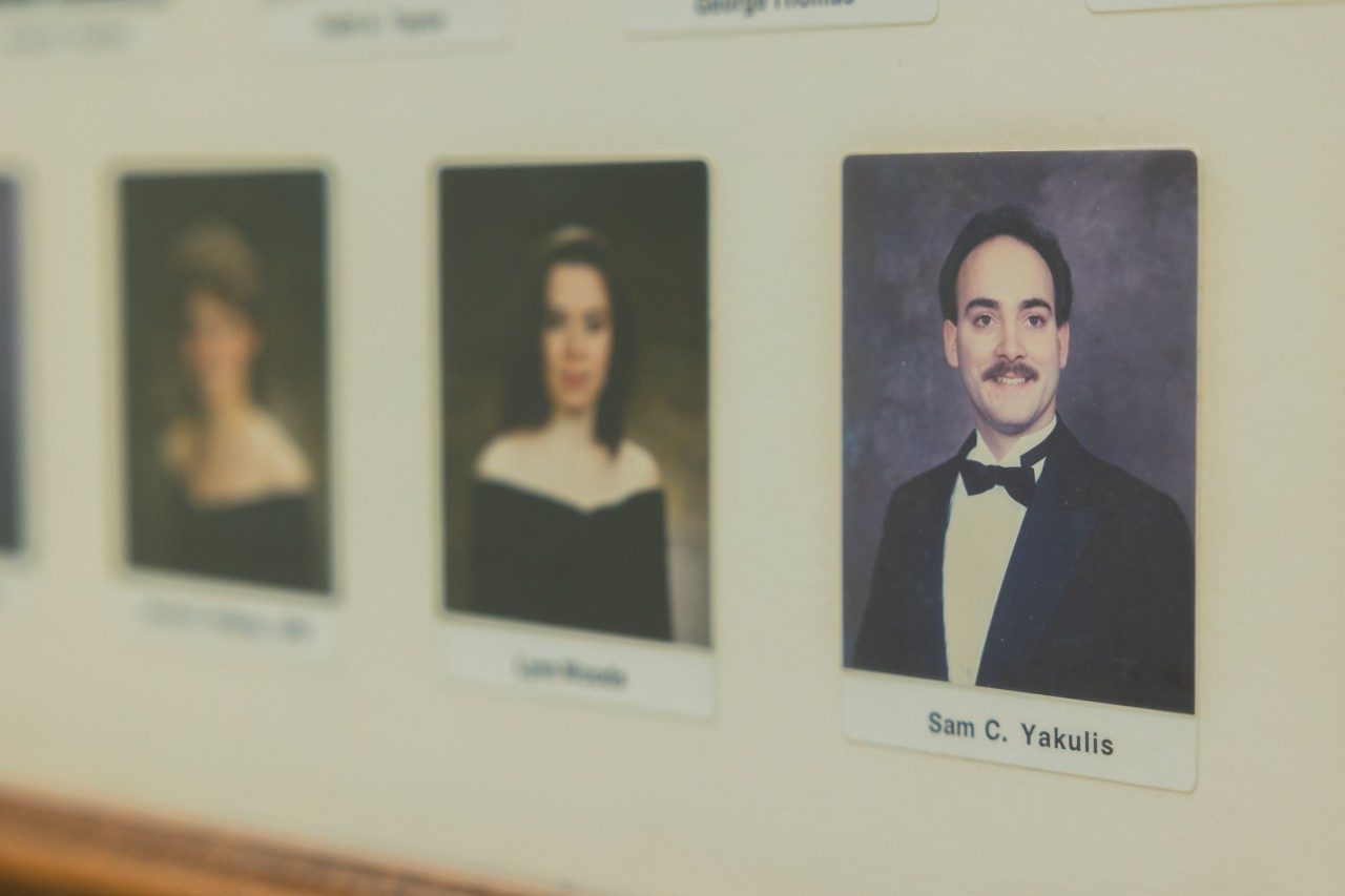 Yakulis' 1991 graduation photo hangs in the stairwell of Whittemore Hall. Photo by Ben Murphy for Virginia Tech.