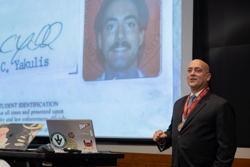 Yakulis shared his 1980s Hokie passport as part of his HLB presentation. Photo by Ben Murphy for Virginia Tech.