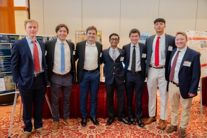 From left: Adam Bowman, William Brown, Jack Gurley, Daniel Alexander, Brian Lee, and Rami Benhamida, all 2025 ECE graduates, stand with their Major Design Experience customer from Virginia Spaceport Authority, Walter Taralia. Photo by Ben Murphy for Virginia Tech.