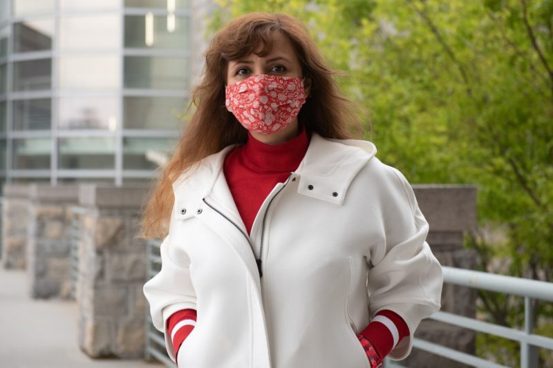 Outdoor photo of Mona Ghassemi learning mask
