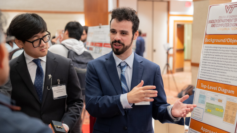 A Virginia Tech ECE student explains his MDE project. Photo by Ben Murphy for Virginia Tech.